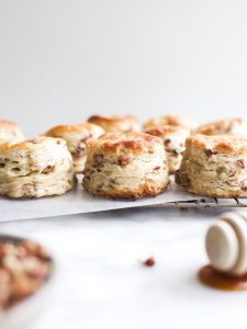Honey Nut Biscuits Recipe by The Wood and Spoon Blog. Flaky butter biscuits sweetened naturally with honey and filled with nuts like pecans or walnuts. This simple recipe makes biscuits with lots of layers and doesn't require laminating. Recipe and other Mother's Day brunch or breakfast menu inspiration on thewoodandspoon.com // woodandspoon.com
