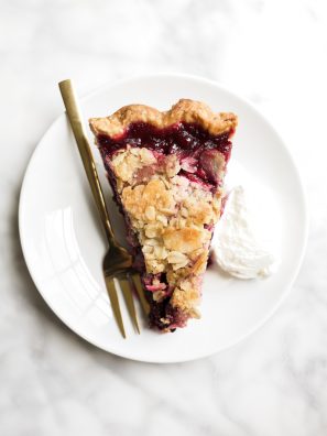 Berry Almond Streusel Pie by Wood and Spoon. This summer fruit pie made with mixed berries including strawberries, raspberries, blueberries, blackberries, dewberries, and more is a sweet dessert for fresh fruit! With an almond crumble topping and a buttery pie crust, this summer pie is a terrific make ahead dessert. Find the recipe on thewoodandspoon.com